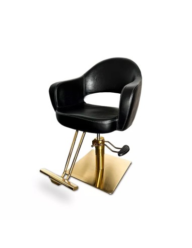 Fotel fryzjerski ze złotym podnóżkiem, czarny